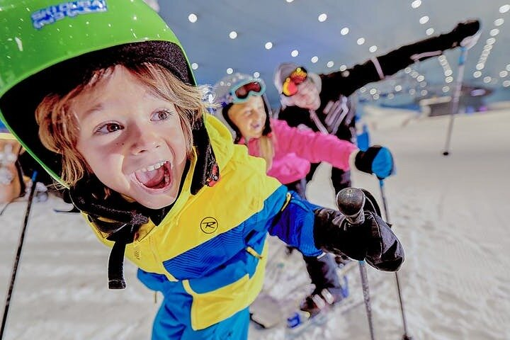 Experience the magic of skiing indoors with stunning snowy slopes cheerful snowball rides cute penguin encounters and warm refreshments at the café all in the heart of Dubai.